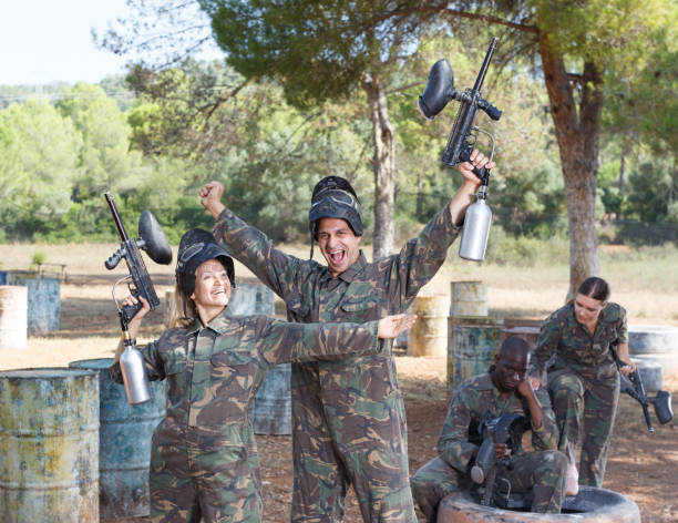 istock Cheerful paintball players 1041091466