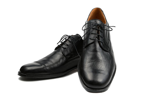 istock black men's leather shoes isolated on white background 104109362