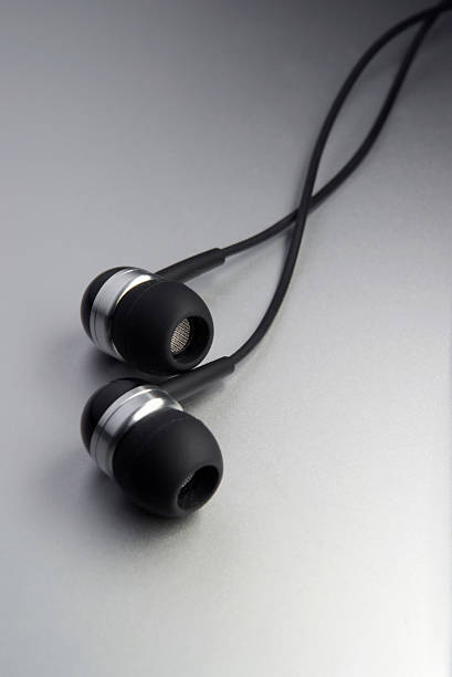 macro shot of black and silver headphones stock photo