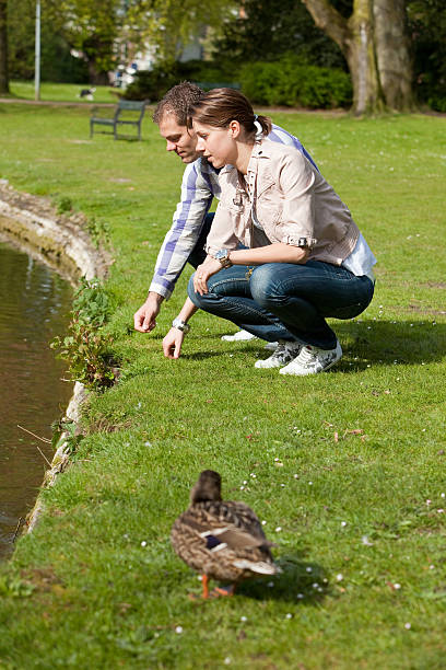 istock Young couple outdoors in the park 104109601