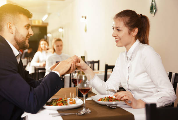 istock Romantic couple is having dinner in the restaurante 1041096698