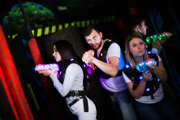 Photo of Young people during lasertag game