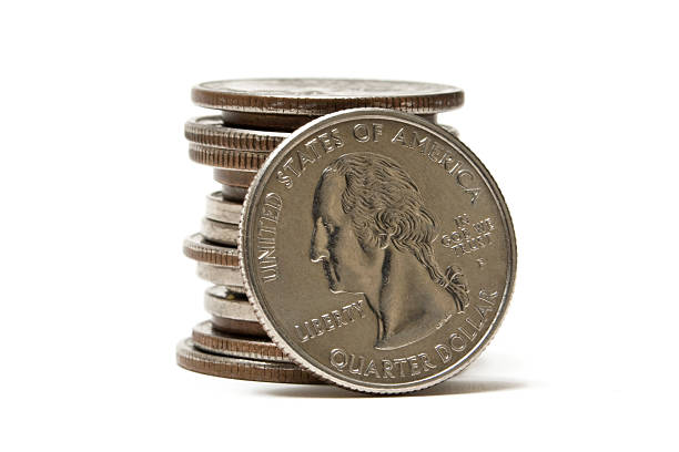 стопка монет - stack quarter coin us coin стоковые фото и изображения