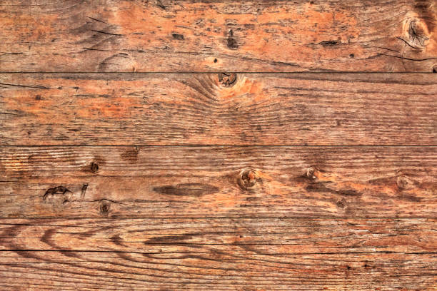 istock Varnished Weathered Knotted Pinewood Paneling Background Texture Detail 1041098242