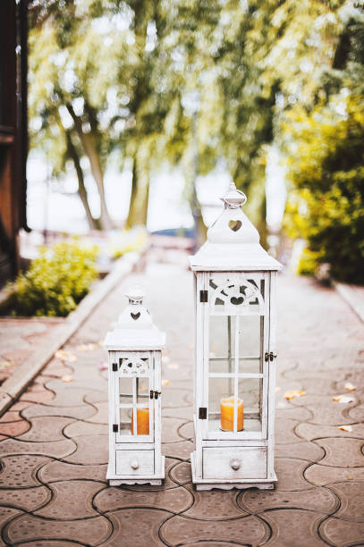 istock Vintage decorative lantern with candles Wedding ceremony 1041101414