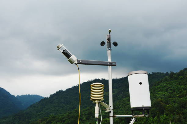 istock pluviometer or rain gauge in mountain with rain cloud on sky 1041109712