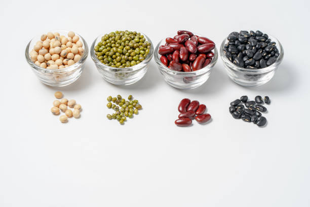 istock Many nuts and sesame seeds on white background. 1041113876