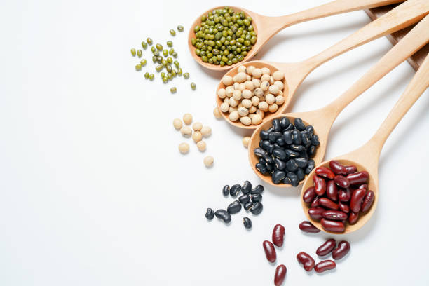 istock Many nuts and sesame seeds on white background. 1041113976