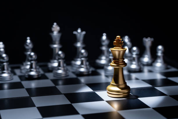 istock Chess board game for business concept in light and shadow. 1041114078
