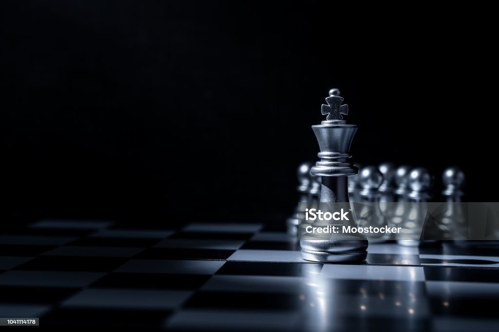 Chess board game for business concept in light and shadow. Chess Stock Photo