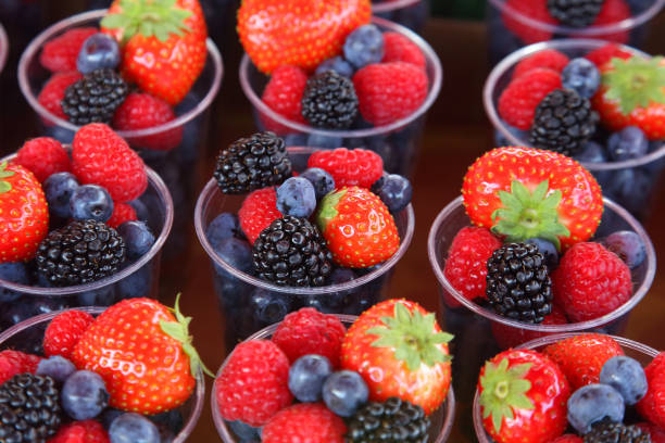 istock set of different berries in glasses 1041114760