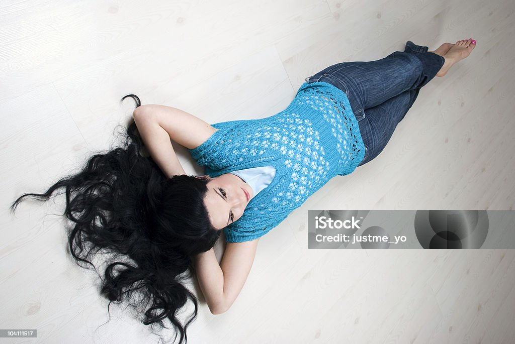 Woman relaxing on the floor  Adult Stock Photo