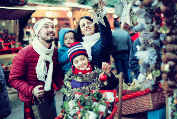 istock Family purchasing Christmas decoration 1041117588