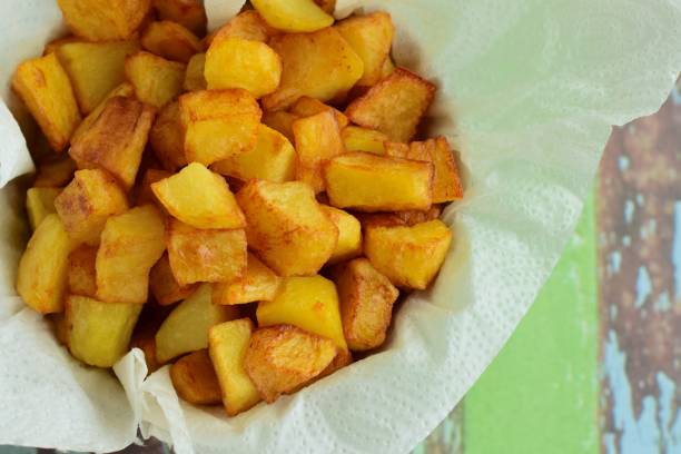Fried cubed potatoes Fried cubed potatoes cube potato stock pictures, royalty-free photos & images