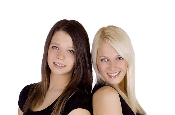 istock Brunette and blond girl 104112956