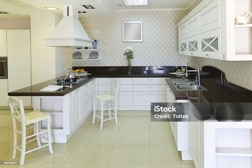 Modern white kitchen Modern white kitchen. Indoor design. Apartment Stock Photo