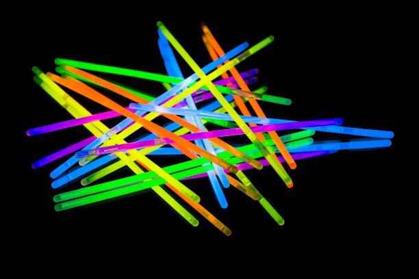 istock Colorful fluorescent light neon big glow stick on mirror reflection black background 1041138878