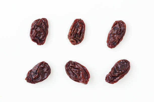 raisins isolated on white, top view - passas imagens e fotografias de stock