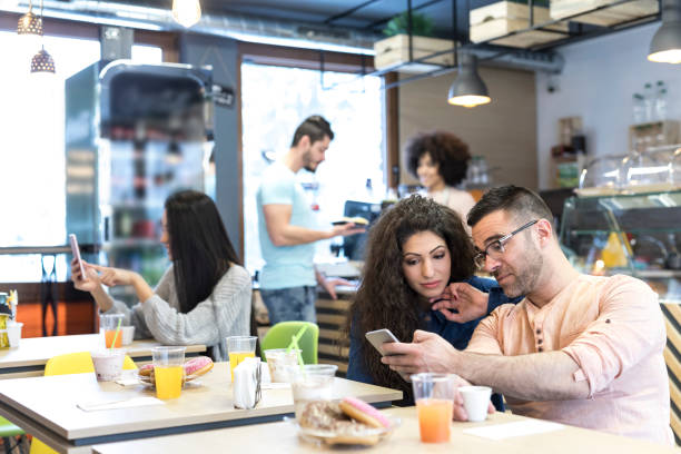 istock Couple taking selfie in fast food restaurant 1041139996