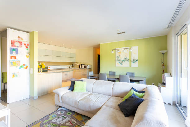 istock Living room with large light and bright sofa 1041144472