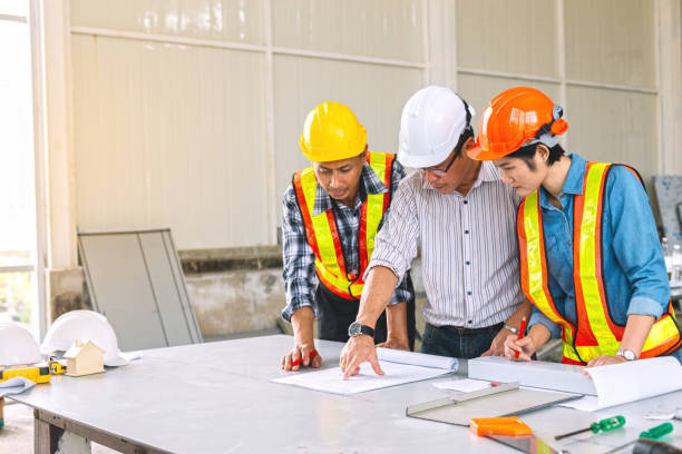 istock Engineers and architect are meeting to plan joint deals at construction sites. 1041146110