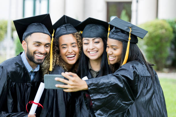 istock Cheerful college friends pose for selfie 1041147928