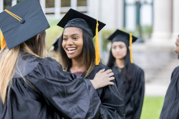 istock Excited female college graduates 1041147960