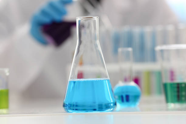 istock Chemical industry bulb with blue magenta 1041148278