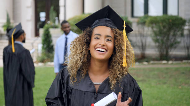 istock Beautiful female graduate 1041149086