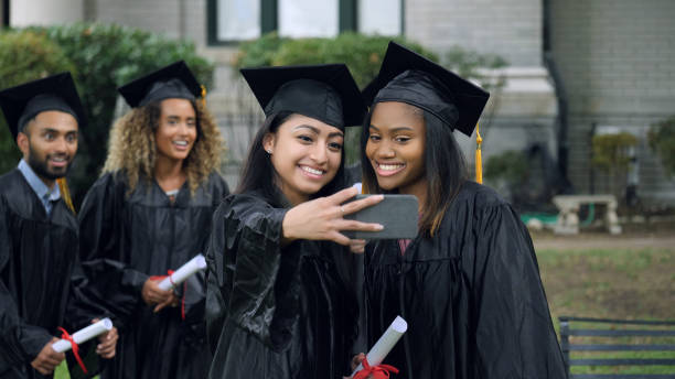 istock Female college friends taking selfie 1041149112