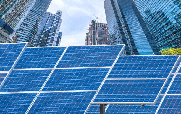 istock Power plant using renewable solar energy with city building background 1041150800