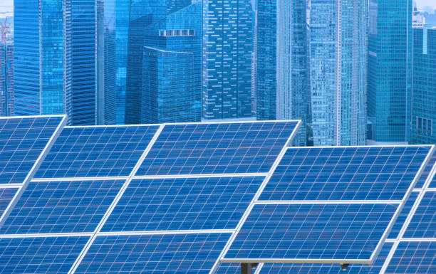 istock Power plant using renewable solar energy with city building background 1041150836