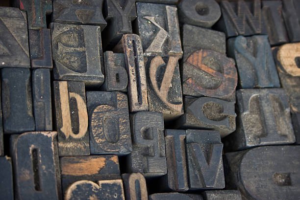 istock Old wooden letterpress characters from a printing press 104115279