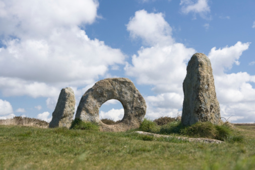 Men An Tol is well known and unique in the UK as there are no other examples of megalithic stones aligned in this way. It is not far from the Nine Maidens stone circle in Penwith Cornwall, England