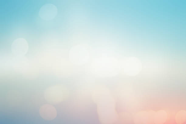 istock blurred beautiful natural pastel background lens ray flare flash light with double exposure of bokeh light 1041155586