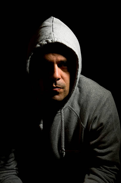 istock Serious man in the dark 104116871