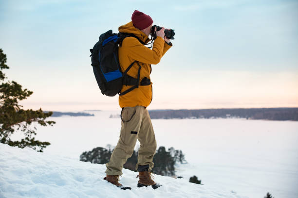 istock Mature traveler with camera exploring Finland 1041168932