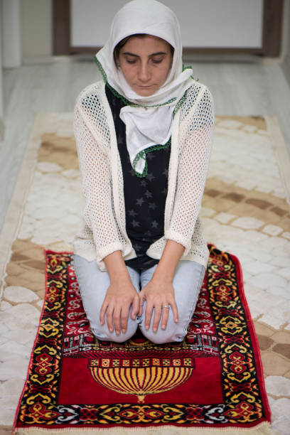 istock Muslim Woman Praying 1041169024