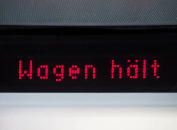 Wagen haelt (meaning Bus stopping) on public transport display