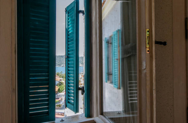 istock Open window with beautiful sea view 1041172874