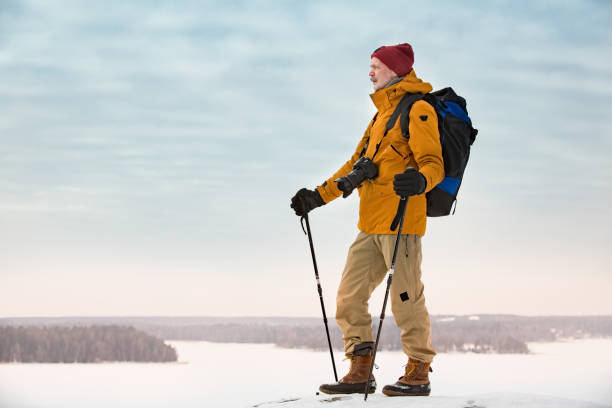 istock Mature traveler with camera exploring Finland 1041173914