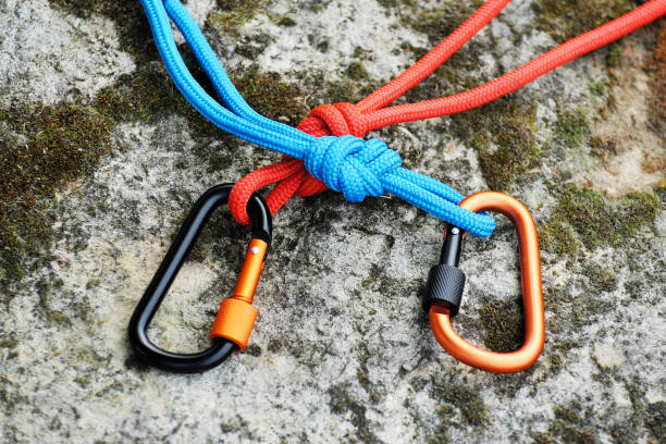 istock Carabiner  on rocky background. 1041175644