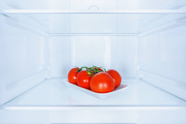 istock ripe red tasty tomatoes in fridge 1041183244