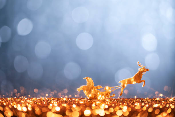 christmas santa sleigh and reindeer - backgrounds defocused - reindeer christmas decoration gold photography imagens e fotografias de stock