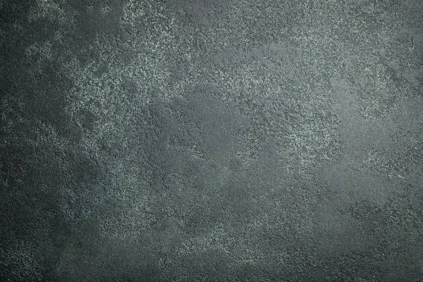 istock Dark stone or slate wall. Grunge background 1041187046