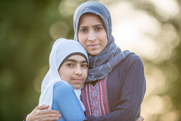 istock Mother And Daughter Hugging 1041191868