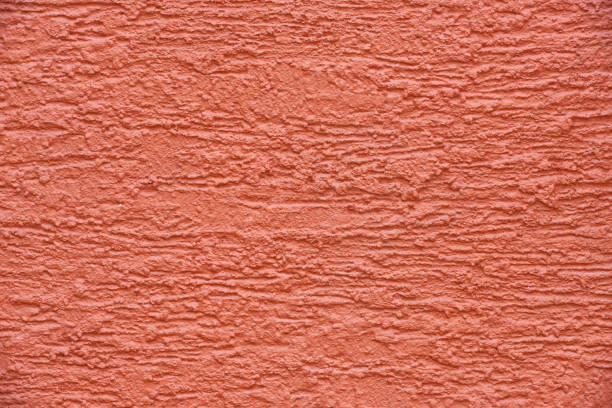 istock close-up view of red concrete wall textured background 1041201038