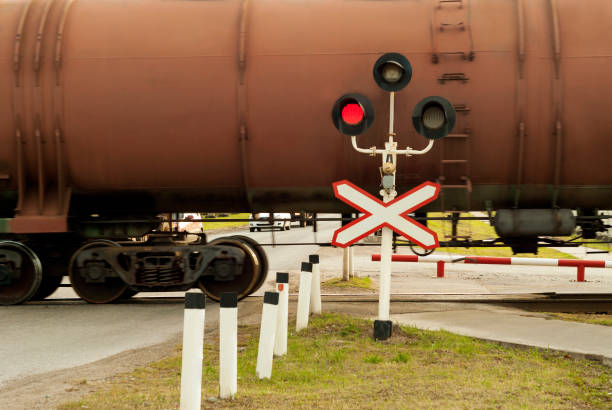 istock traffic light and sign at the railway crossing 1041202682