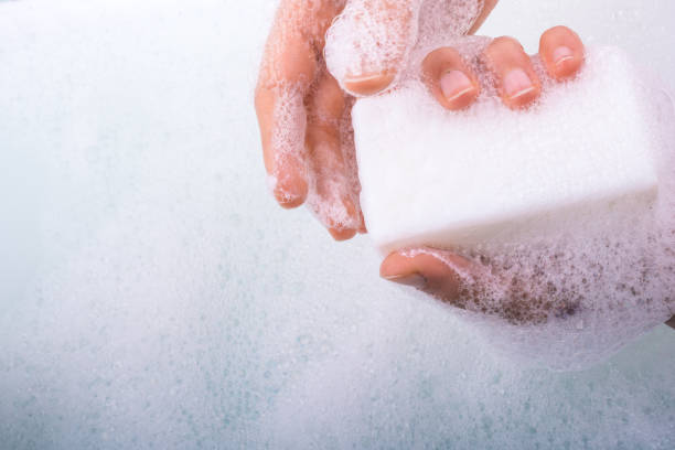 istock Child washing hands with soap 1041204516