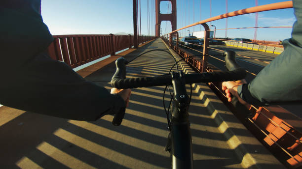 istock Commuter with road racing bicycle and Golden Gate Bridge 1041206898
